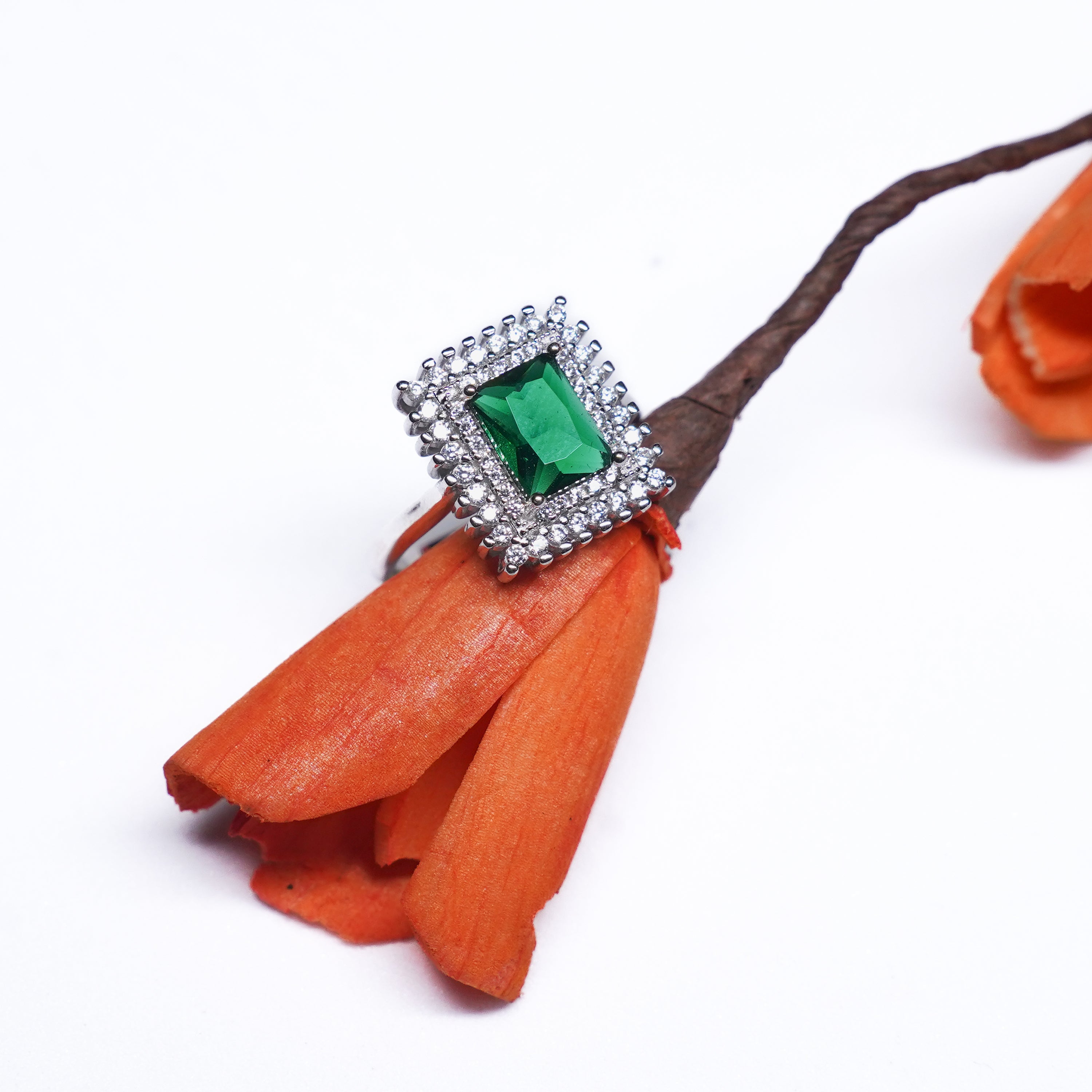 Emerald Elegance: 92.5 Silver Halo Ring with Green Gemstone