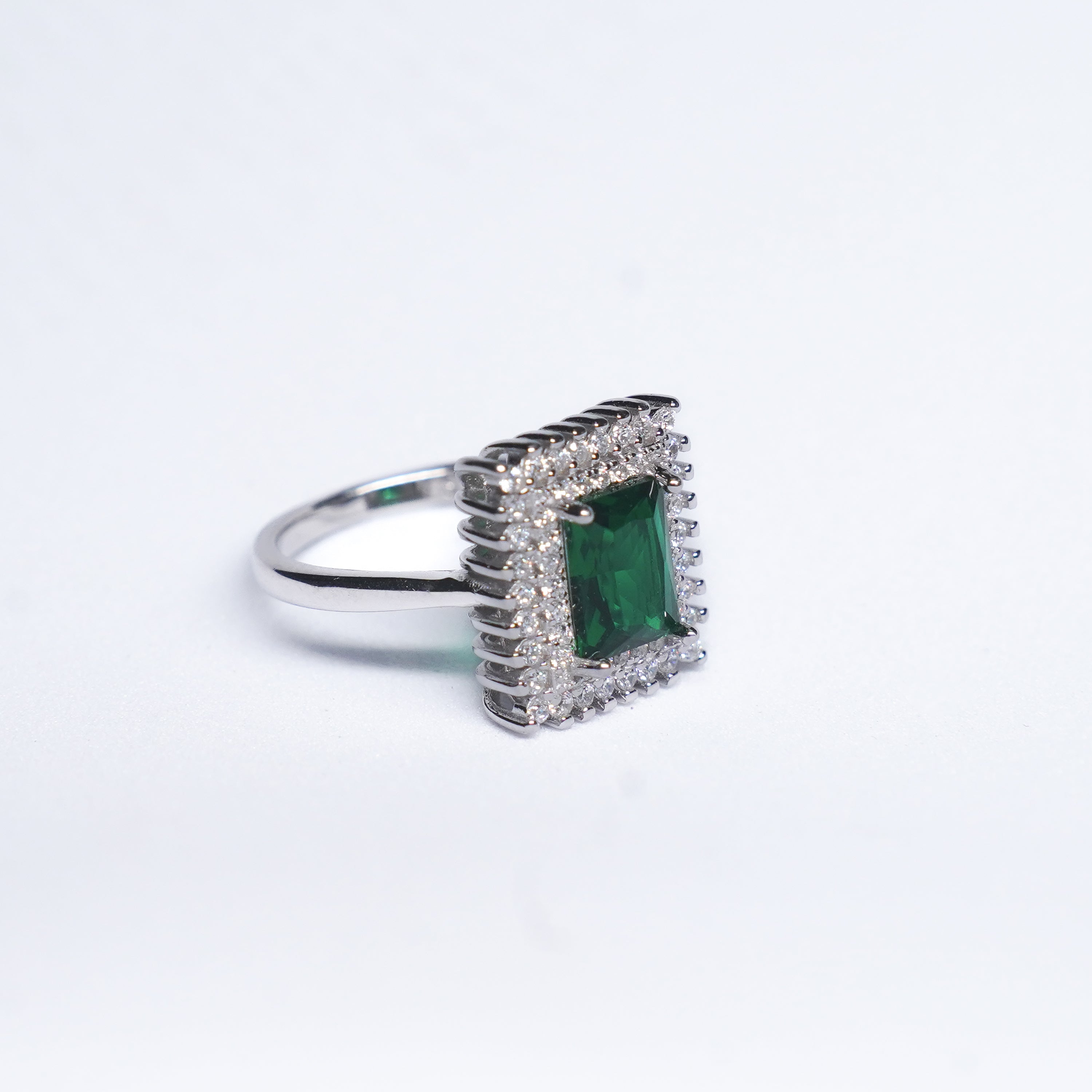 Emerald Elegance: 92.5 Silver Halo Ring with Green Gemstone