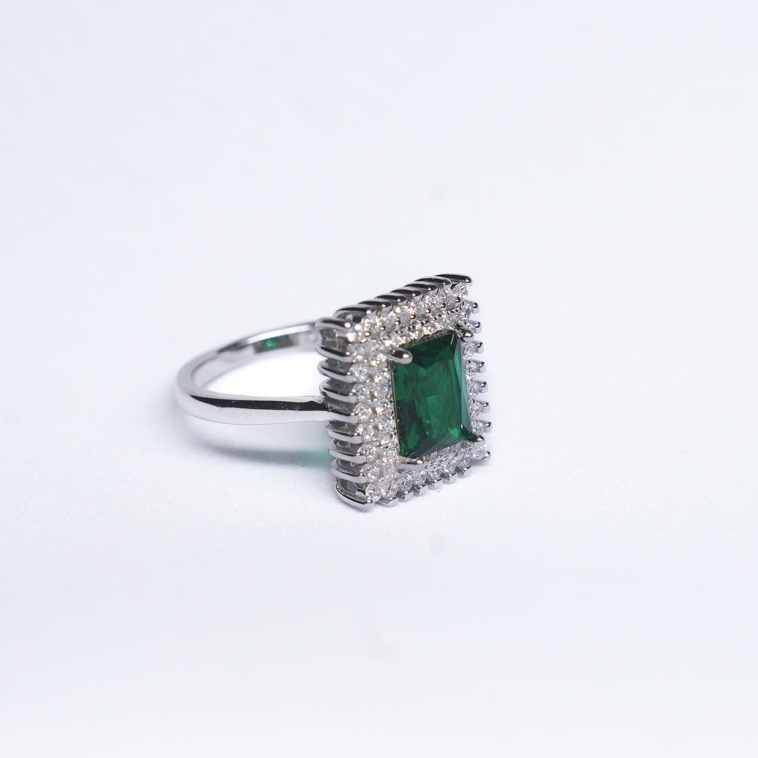 Emerald Elegance: 92.5 Silver Halo Ring with Green Gemstone