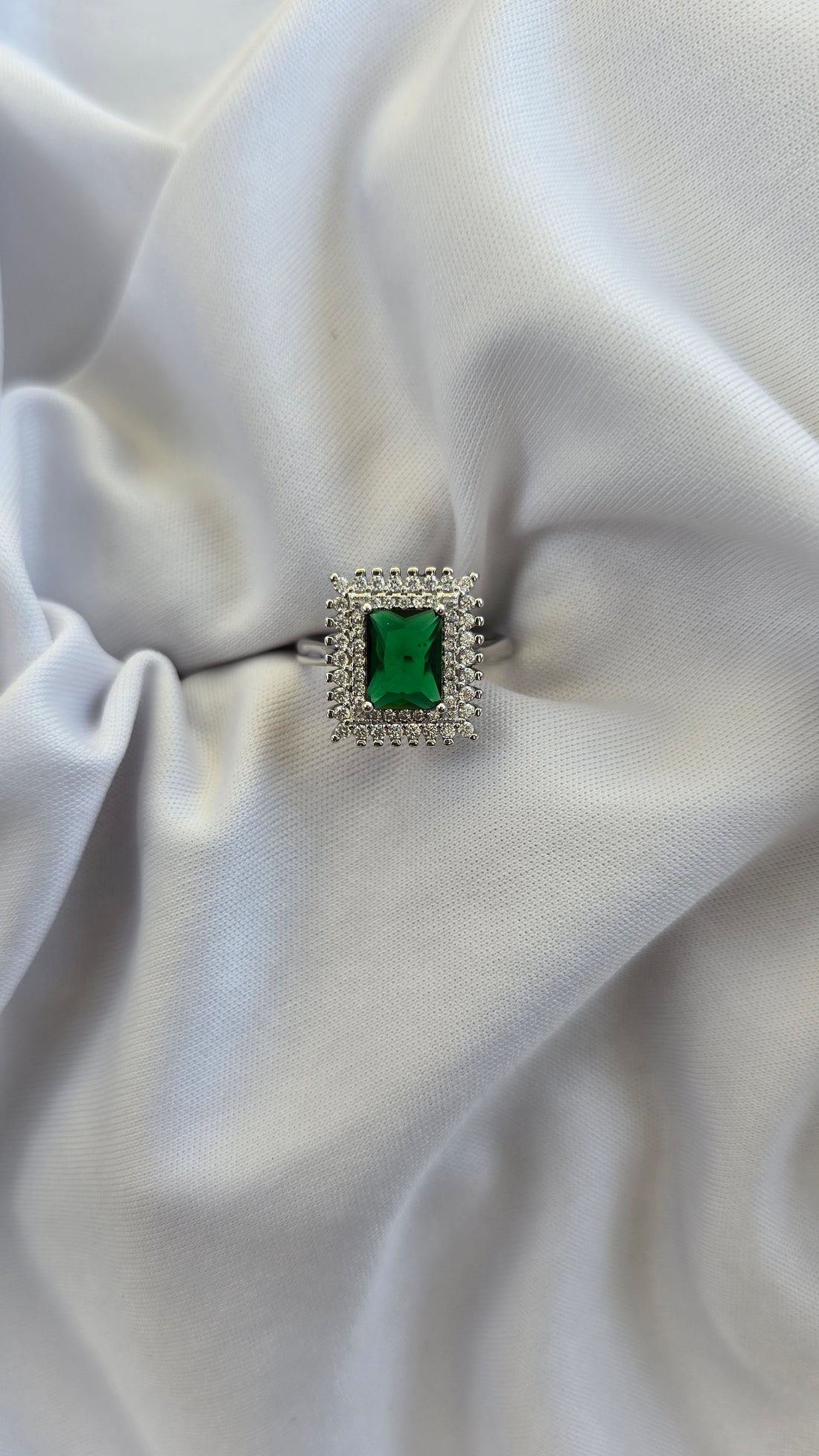 Emerald Elegance: 92.5 Silver Halo Ring with Green Gemstone